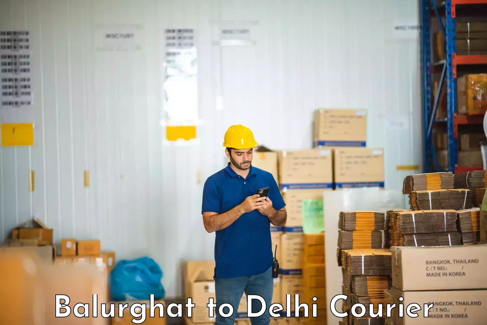 Skilled furniture transport Balurghat to East Delhi
